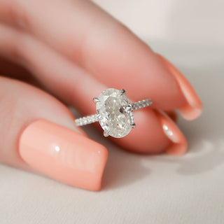 Graceful 2.0ct oval hidden halo moissanite ring front view