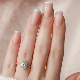 Luminous 2.0ct oval hidden halo moissanite ring angled view showing its sparkle