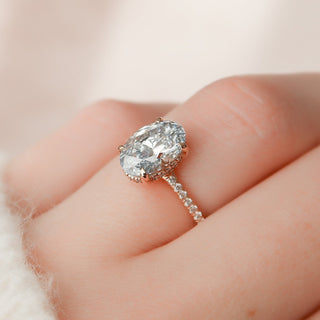 Luminous 2.0ct oval hidden halo moissanite ring close up of the setting