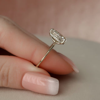 Brilliant 2.0ct pear hidden halo moissanite ring three quarter angled view