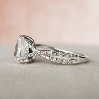 Shimmering 1.0ct pear hidden halo moissanite ring sparkle close up