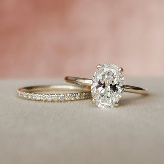 Brilliant 1.50ct oval hidden halo moissanite wedding band side profile view