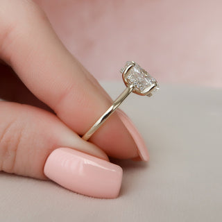 Delicate 3.0ct oval hidden halo moissanite ring close up of the setting