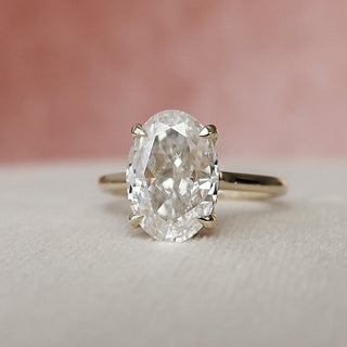 Delicate 3.0ct oval hidden halo moissanite ring three quarter angled view