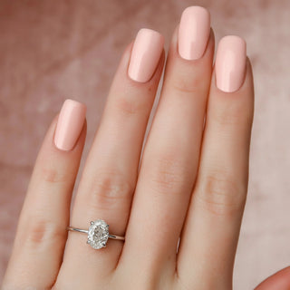 Timeless 1.5ct oval hidden halo moissanite wedding band three quarter angled view