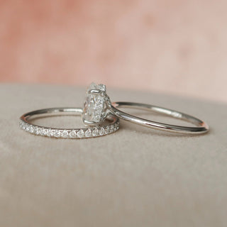 Timeless 1.5ct oval hidden halo moissanite wedding band side profile view