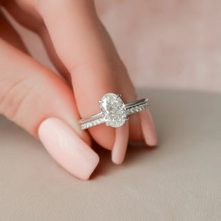 Timeless 1.5ct oval hidden halo moissanite wedding band front view
