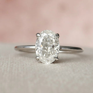 Timeless 1.5ct oval hidden halo moissanite wedding band sparkle close up