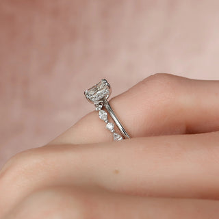 Sparkling 1.0ct radiant hidden halo moissanite wedding band side profile view