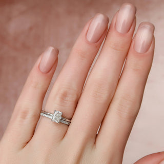 Elegant 1.0ct radiant hidden halo moissanite wedding band angled view showing its sparkle