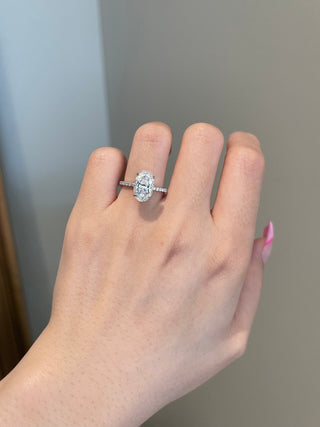 Radiant 3.0ct oval hidden halo moissanite ring angled view showing its sparkle