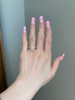 Timeless 3.0ct oval hidden halo moissanite ring side profile view