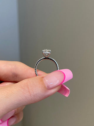 Timeless 3.0ct oval hidden halo moissanite ring top view