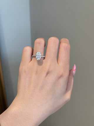 Luminous 3.0ct oval hidden halo moissanite ring close up of the setting