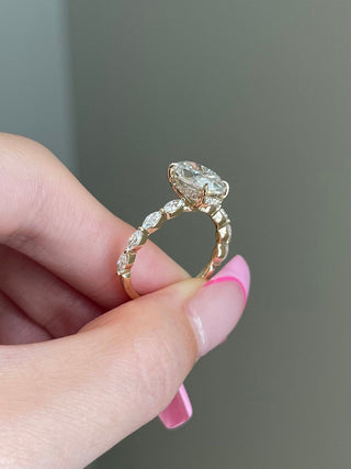 Timeless 3.0ct oval hidden halo moissanite ring shown on a finger