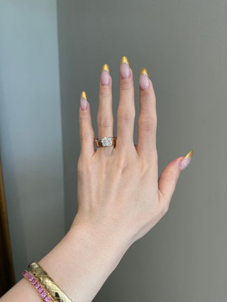Radiant 3.0ct cushion solitaire moissanite ring shown on a finger