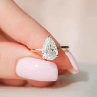 2.0 CT Pear Solitaire Classic Moissanite Engagement Ring on hand