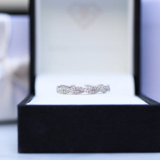 Classic round full eternity moissanite wedding band overhead view