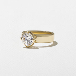 Timeless 2.0ct round moissanite wedding band angled view showing its sparkle