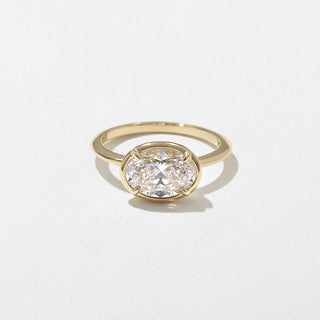 Vintage 2.0ct oval solitaire moissanite wedding band angled view showing its sparkle