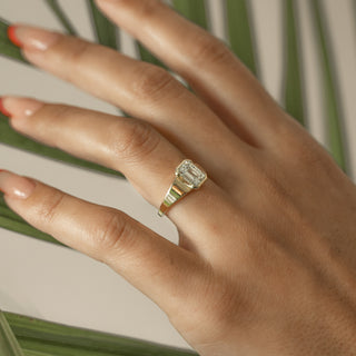 1.50ct Emerald Cut Diamond Bezel Cradled Band Engagement Ring