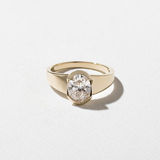 1.50ct Oval Cut Diamond Bezel Cradled Band Engagement Ring