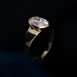 1.50ct Oval Cut Diamond Bezel Cradled Band Engagement Ring