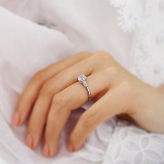 Classic 1.0ct round three stone moissanite ring top view