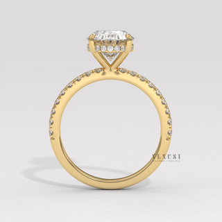 Oval shaped moissanite engagement ring on hand