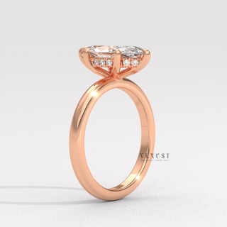 Side profile of a marquise cut moissanite engagement ring in a hidden halo solitaire setting