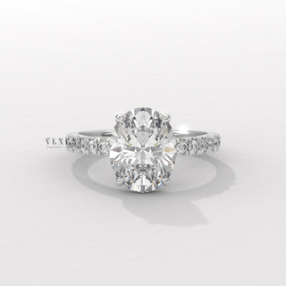 Hidden halo oval moissanite ring with pave setting