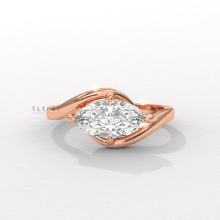 Marquise cut moissanite ring with east west setting
