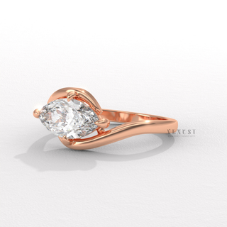 Bypass moissanite engagement ring angled view