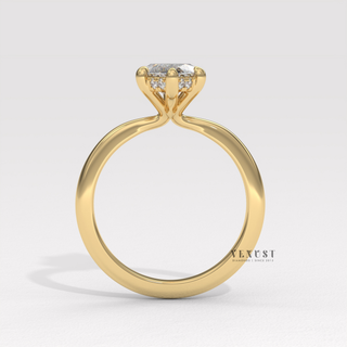 Low-angle view of a marquise cut moissanite engagement ring in a hidden halo solitaire setting