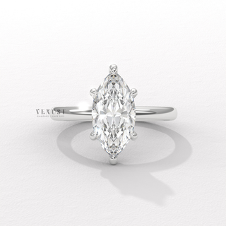 Three-quarter angle of a marquise cut moissanite engagement ring in a hidden halo solitaire setting