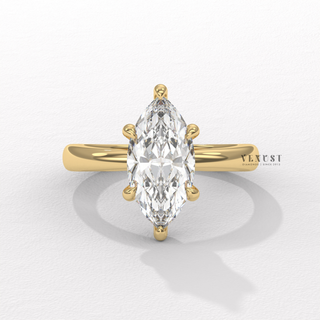 Angled view of a marquise cut moissanite engagement ring in a hidden halo solitaire setting catching the light