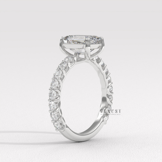Rose gold emerald cut moissanite ring on hand