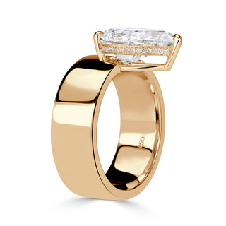 Pear moissanite cigar band engagement ring close up detail