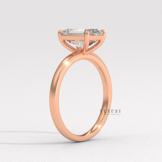 Solitaire emerald moissanite ring top view