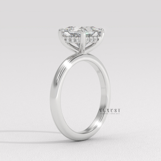 Front view of a princess cut moissanite engagement ring in a hidden halo solitaire setting from the left