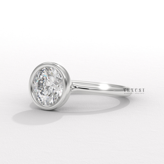 Bezel round moissanite ring angled view