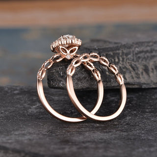 Modern 1.50ct oval halo moissanite ring shown on a finger