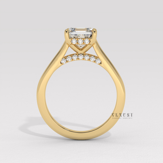 Front view of a asscher cut moissanite engagement ring with a hidden halo and cathedral setting from the right