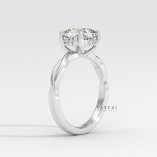 Side profile of a cushion cut moissanite engagement ring on an infinity band