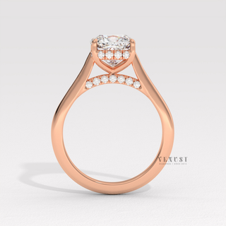 Side profile of a cushion cut moissanite engagement ring with a hidden halo and cathedral setting