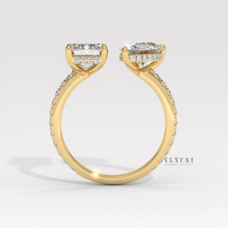 Emerald pear cut moissanite engagement ring angled view