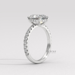 Oval pave moissanite engagement ring close up