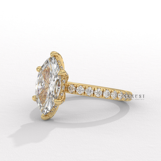 Side profile of a marquise cut moissanite engagement ring with a hidden halo and pave band