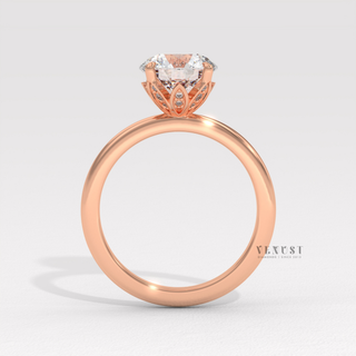 Round bridal moissanite ring with prong detail