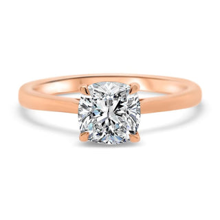 Lustrous 1.0ct cushion solitaire moissanite ring shown on a finger